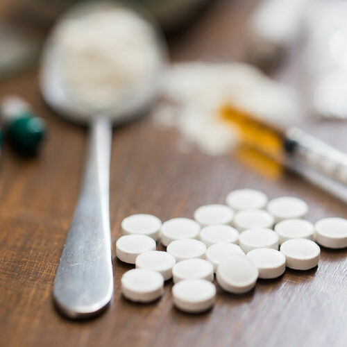 Assorted Drugs Strewn Across a Table